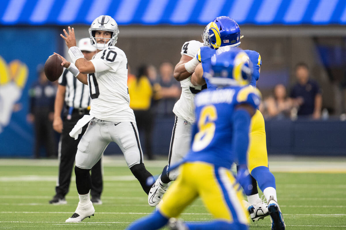 Las Vegas Raiders quarterback Jimmy Garoppolo (10) throws a pass during an NFL preseason footba ...