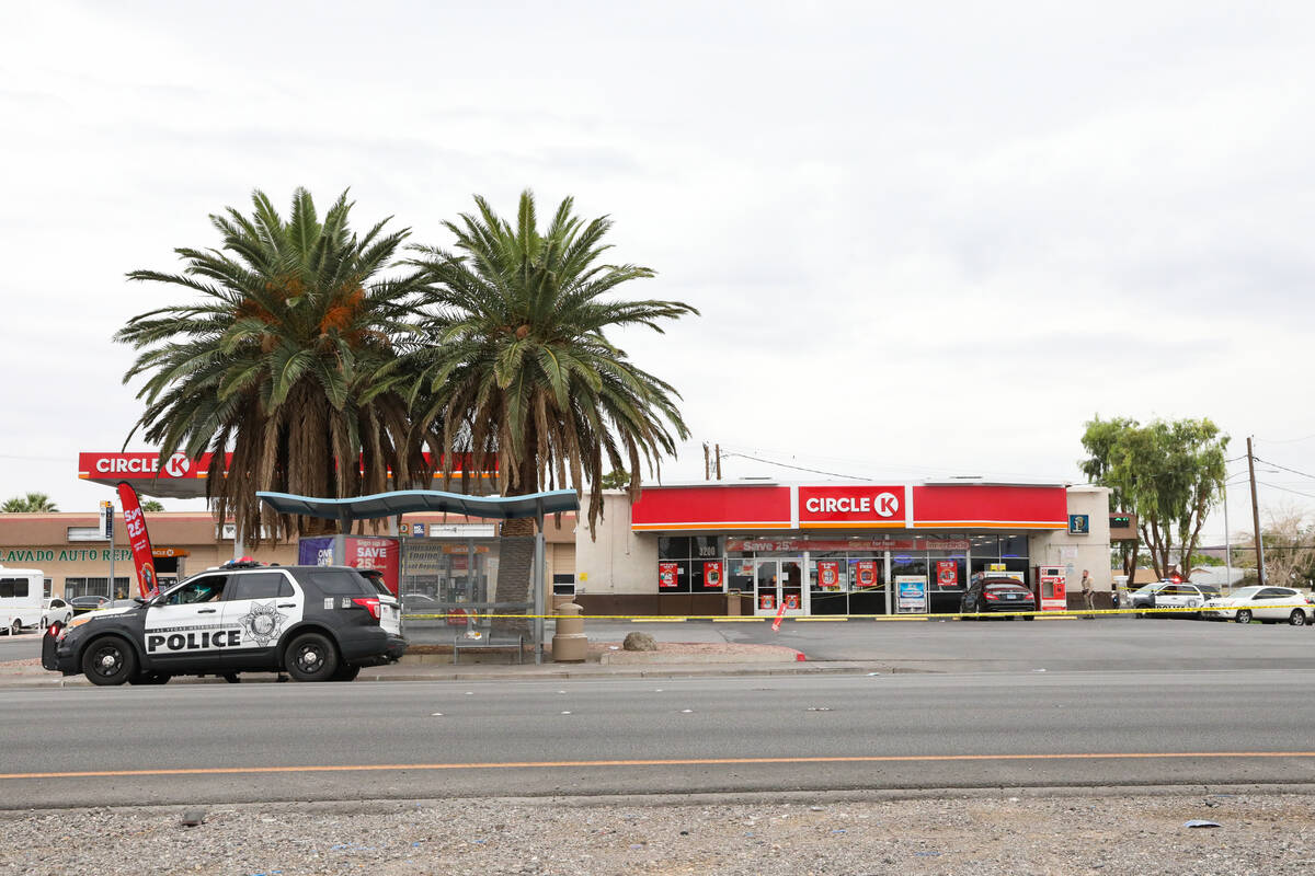 Police respond to a shooting at a Circle K on the corner of Fremont Street and St. Louis Avenue ...