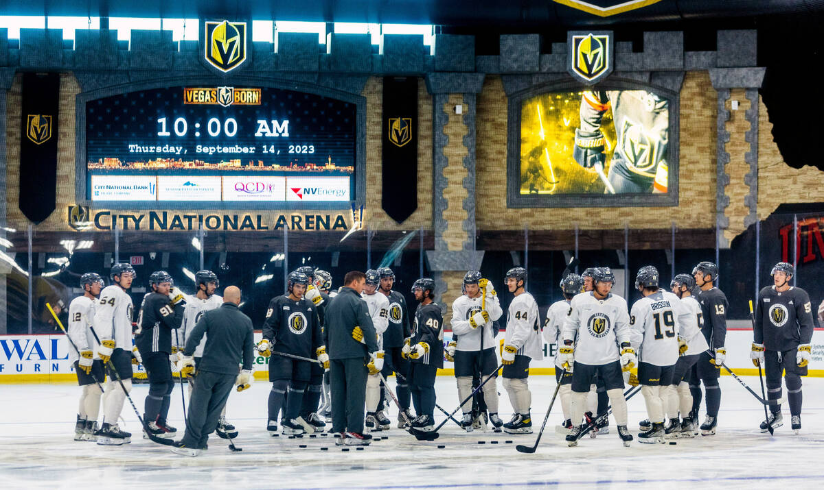 Golden Knights rookies gather with coaches during practice at City National Arena on Thursday, ...