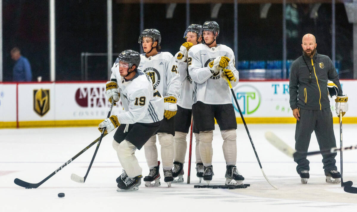 Golden Knights rookie forward Brendan Brisson (19) looks to a pass during practice at City Nati ...