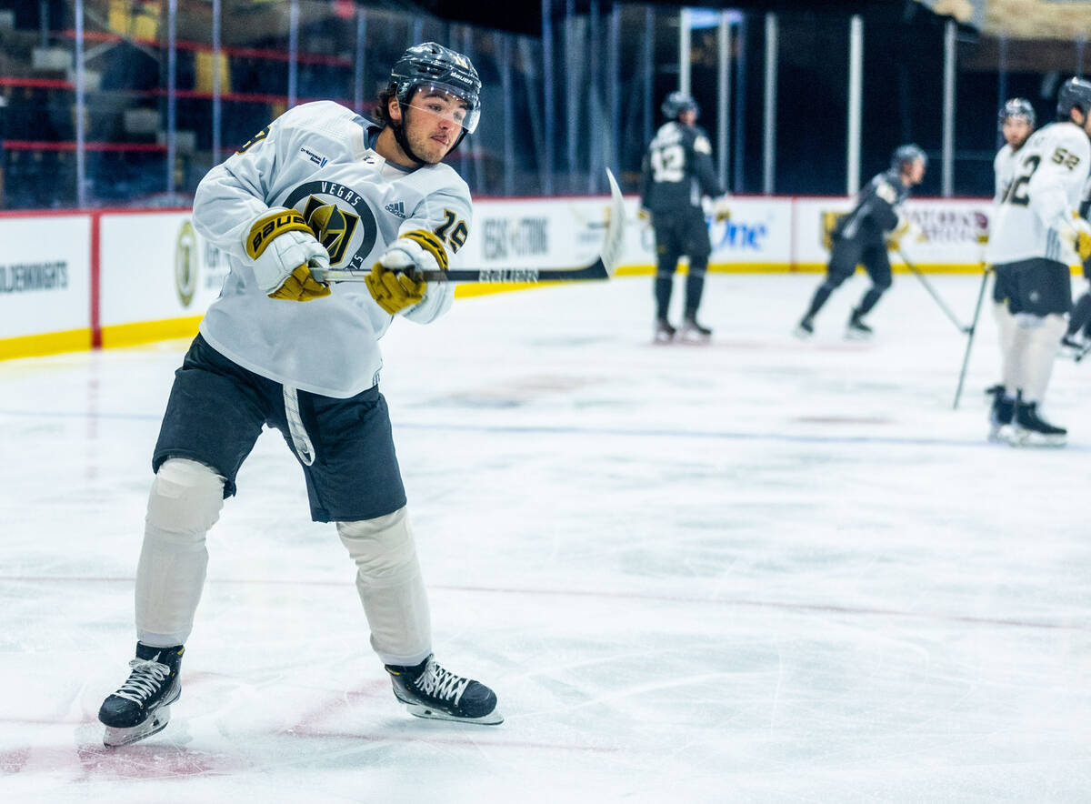 Golden Knights rookie forward Brendan Brisson (19) looks to a shot on goal during practice at C ...