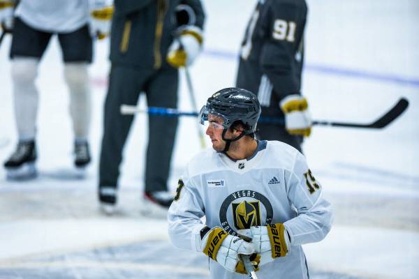 Golden Knights rookie forward Brendan Brisson (19) looks up the ice during practice at City Nat ...