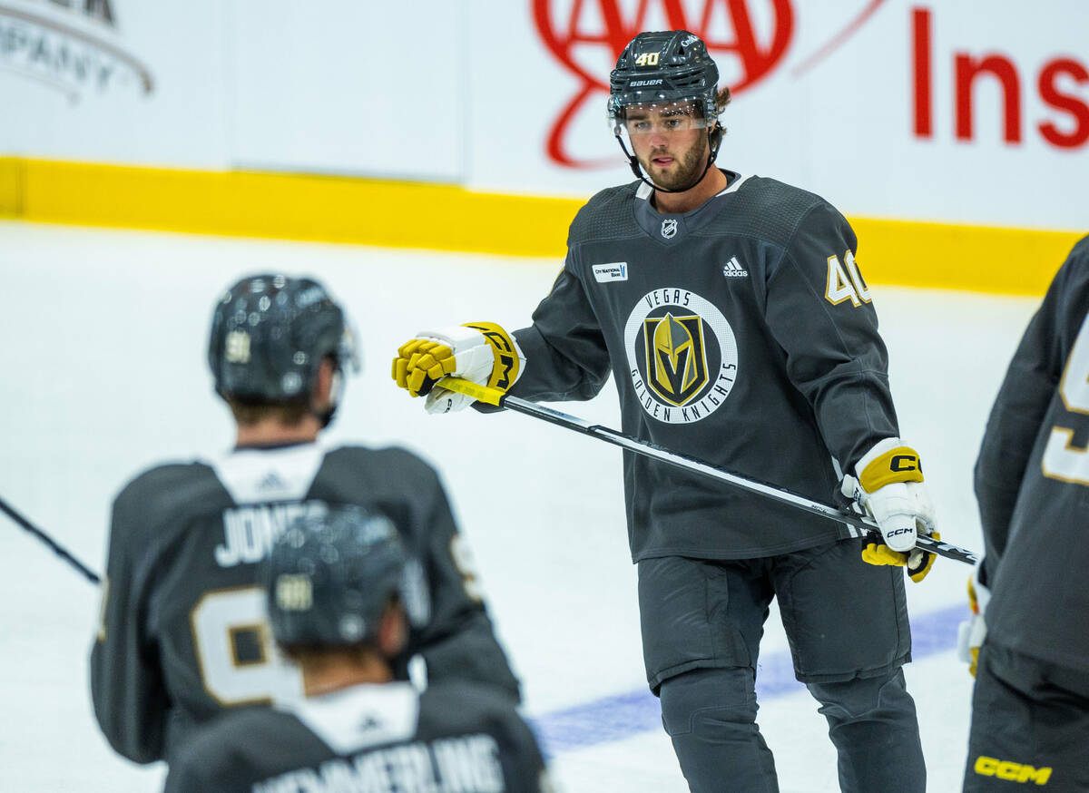 Golden Knights rookie defenseman Lukas Cormier (40) looks down the ice during practice at City ...