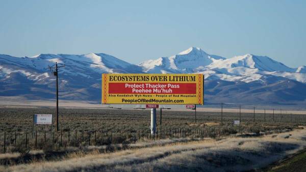 A billboard displays "Protect Thacker Pass" near the Fort McDermitt Paiute-Shoshone Indian Rese ...
