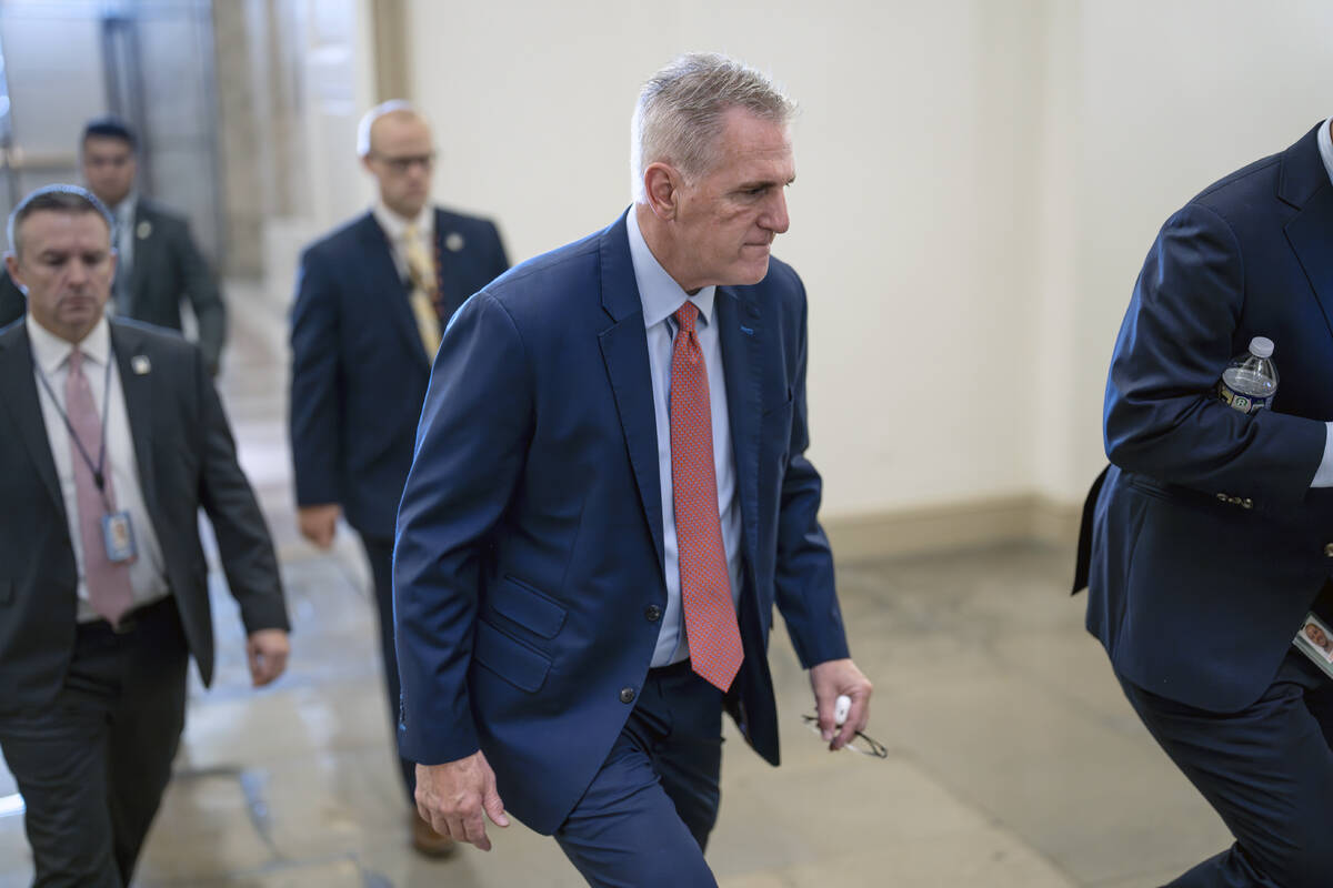 Speaker of the House Kevin McCarthy, R-Calif., arrives at the Capitol in Washington, early Tues ...