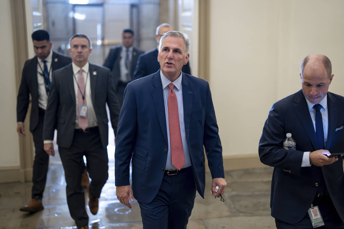 Speaker of the House Kevin McCarthy, R-Calif., arrives at the Capitol in Washington, early Tues ...