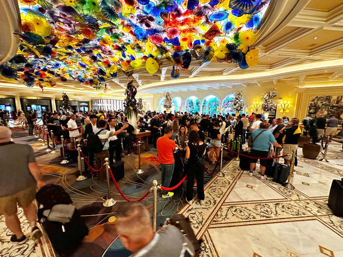 Long lines at the Bellagio front desk as guests wait to check-in on Tuesday, Sept. 12, 2023. (S ...