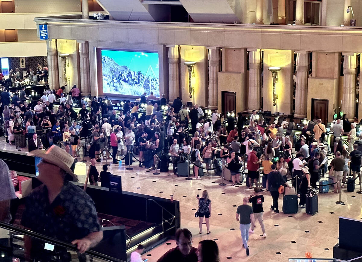 Long lines at the Luxor front desk as guests wait to check-in on Tuesday, Sept. 12, 2023. (L.E. ...