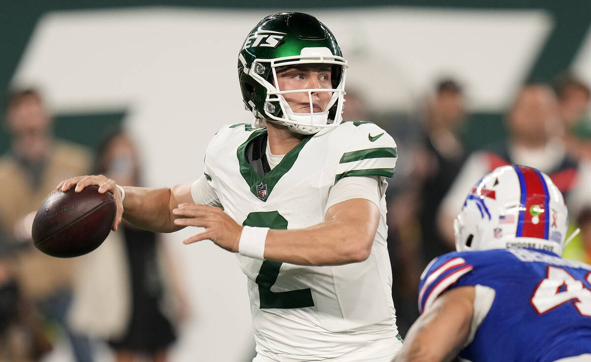 New York Jets quarterback Zach Wilson (2) passes against the Buffalo Bills during the first qua ...