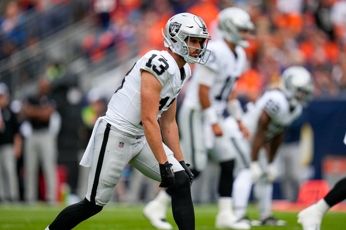 Las Vegas Raiders wide receiver Hunter Renfrow (13) warms up against the Denver Broncos during ...