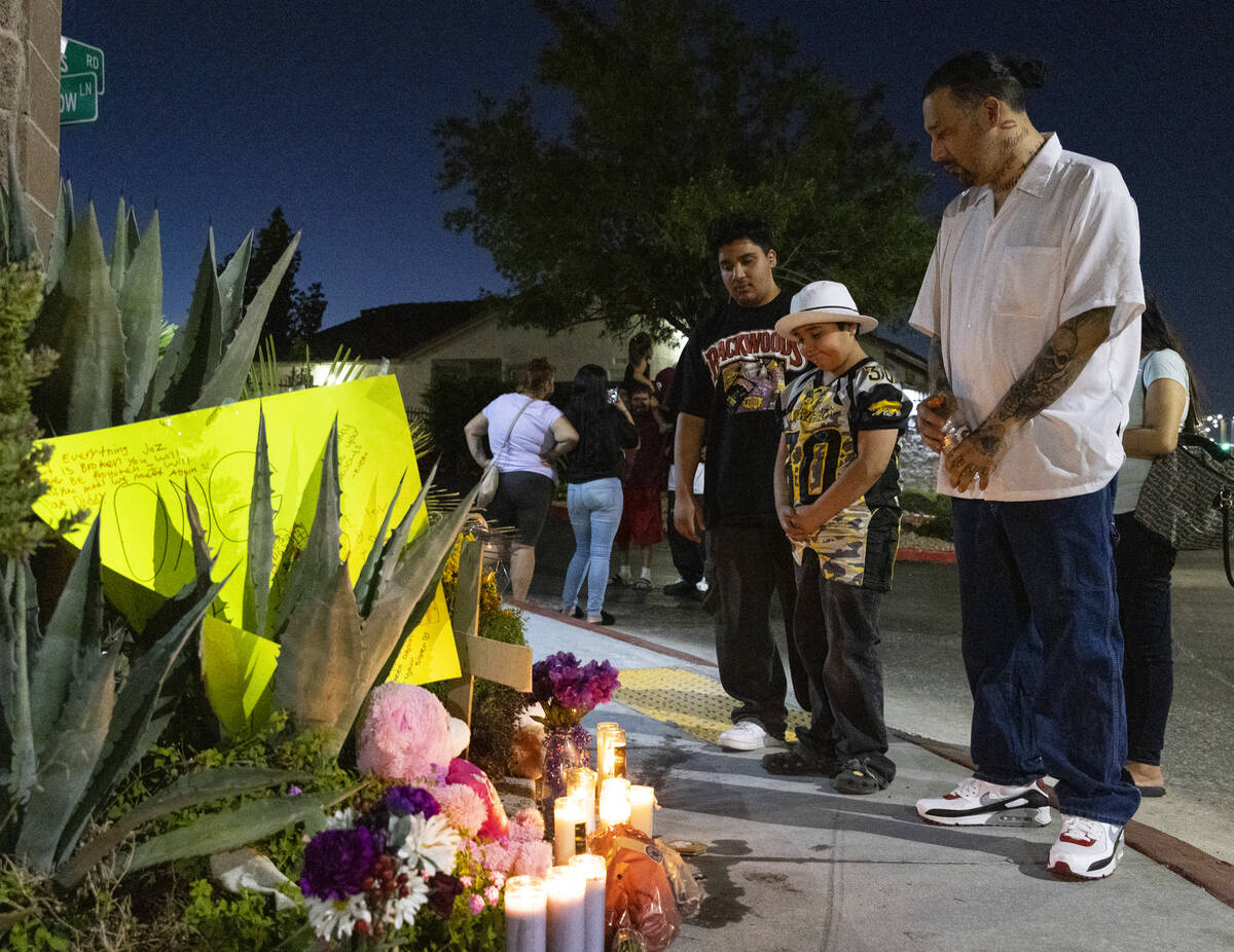 Richard Portillo, the father of Jasmine Portillo, 17, and his sons Christian, left, and Elijah, ...