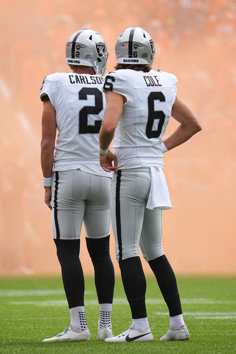 Las Vegas Raiders place kicker Daniel Carlson (2) and Las Vegas Raiders punter AJ Cole (6) prio ...