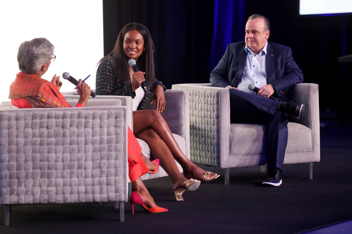 Moderator Punam Mathur, left, interviews Pilar Harris, senior director of corporate social resp ...