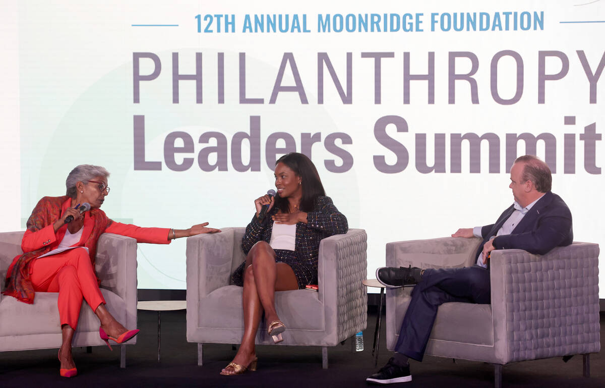 Moderator Punam Mathur, left, interviews Pilar Harris, senior director of corporate social resp ...