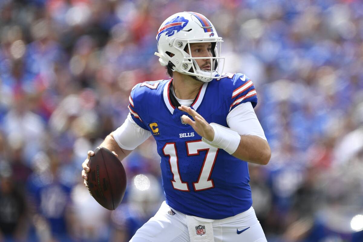 Buffalo Bills quarterback Josh Allen (17) looks to pass during the first half of an NFL footbal ...