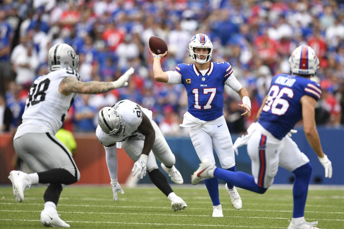 Buffalo Bills quarterback Josh Allen (17) throws a pass to Dalton Kincaid (86) during the first ...