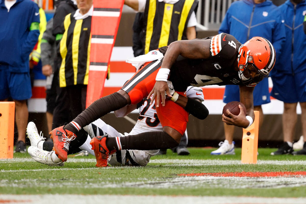 Cleveland Browns quarterback Deshaun Watson (4) scores a touchdown during an NFL football game ...