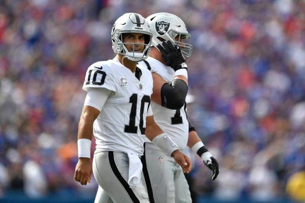 Las Vegas Raiders quarterback Jimmy Garoppolo (10) reacts after throwing an interception during ...