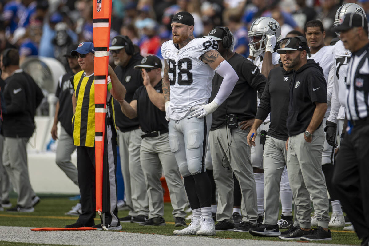 Raiders defensive end Maxx Crosby (98) looks on from the sideline during the first half of an N ...