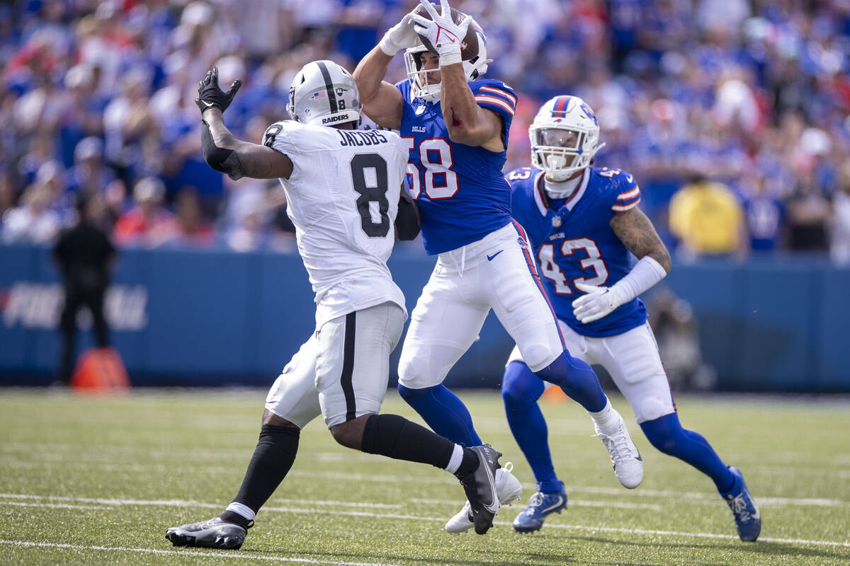 Buffalo Bills linebacker Matt Milano (58) intercepts a pass intended for Raiders running back J ...