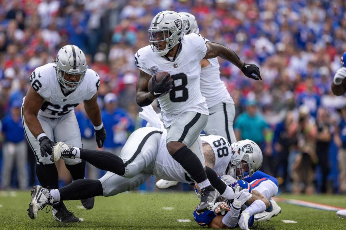 Las Vegas Raiders running back Josh Jacobs (8) rushes during an NFL football game, Sunday, Sept ...