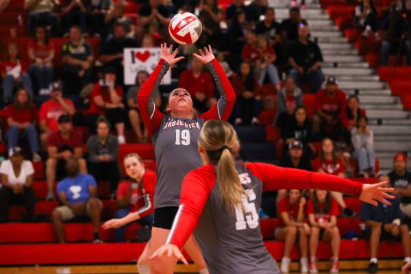 Arbor View’s Claire Hiller (19) sets the ball during a volleyball game between Arbor Vie ...