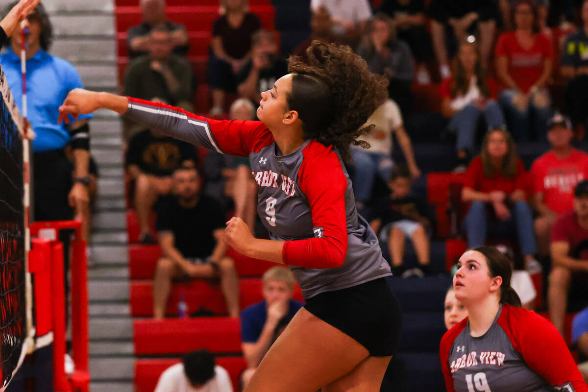 Arbor View’s Willow Watson (9) spikes the ball during a volleyball game between Arbor Vi ...