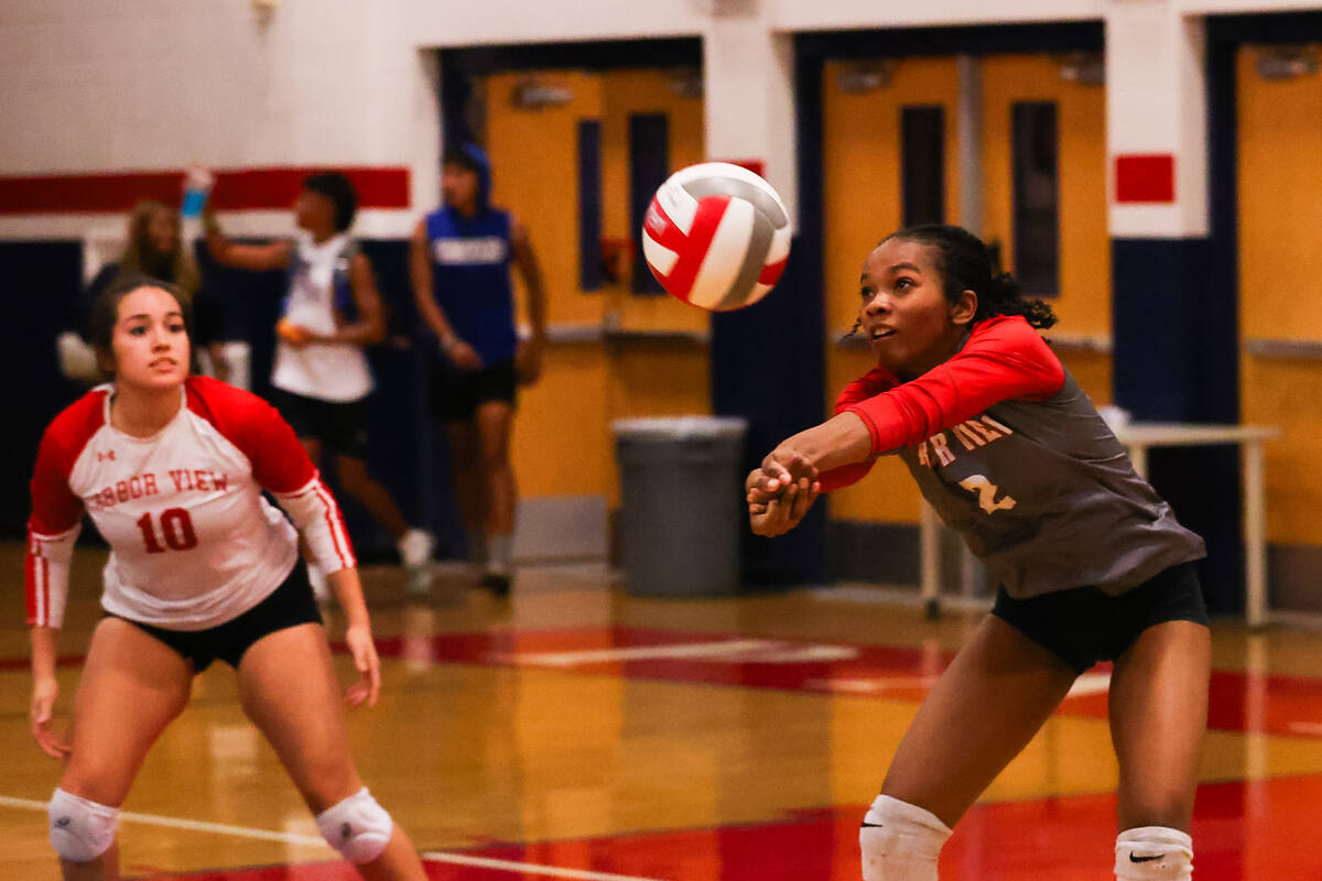 Arbor View’s Cameron Reese (2) returns a serve during a volleyball game between Arbor Vi ...