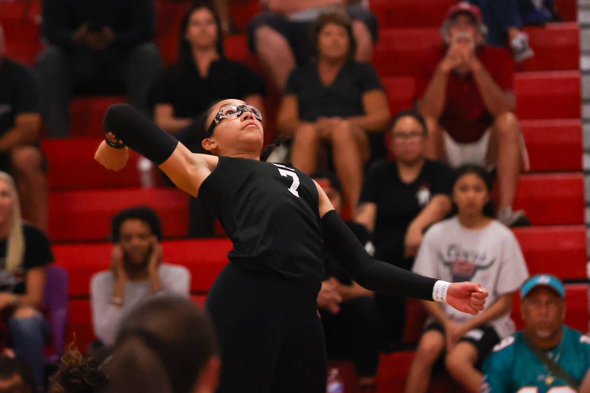 Liberty’s Jayda Hutchins (7) prepares to spike the ball during a volleyball game between ...