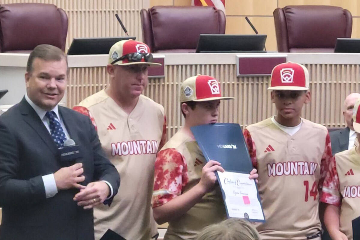 Jim Seebock talks to the Henderson All-Stars Little League baseball team in a Henderson City Co ...