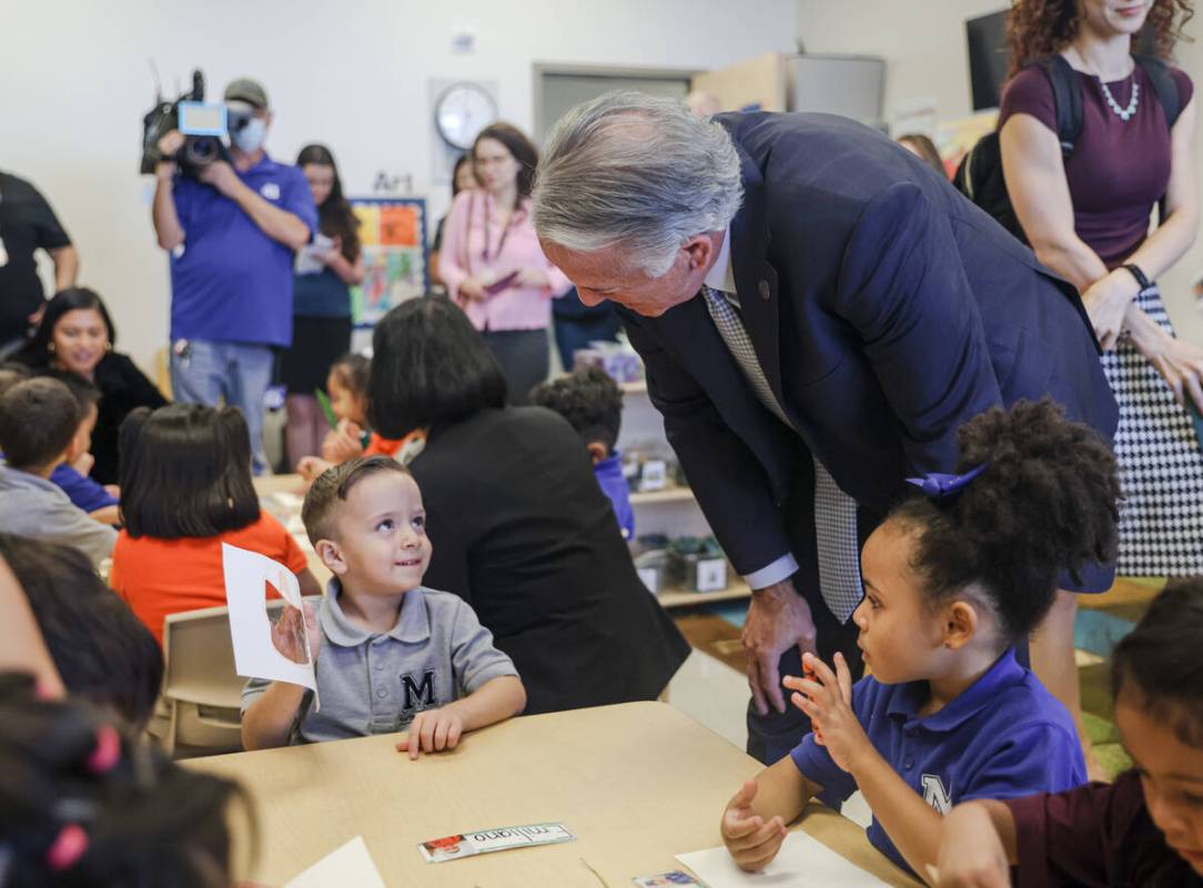 Gov. Joe Lombardo speaks with Emiliano Guzman Valdivida, 4, during a pre-K lesson at Mater Acad ...