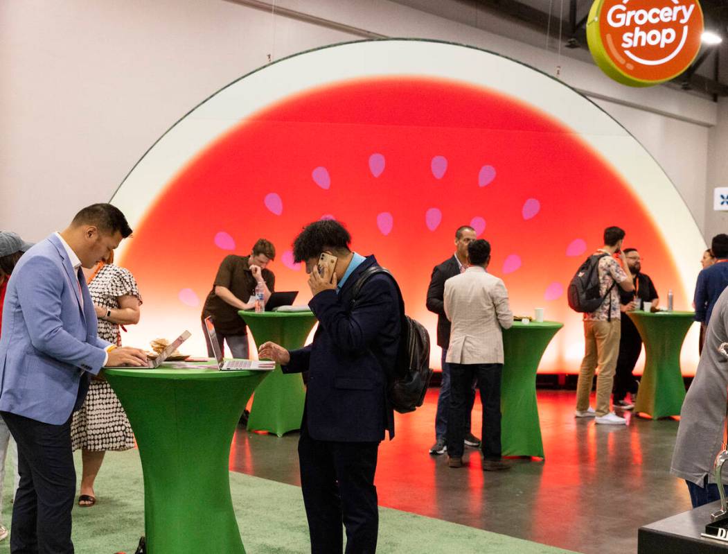 Conventioners work at Grocery Convention at Mandalay Bay Convention Center, on Wednesday, Sept. ...