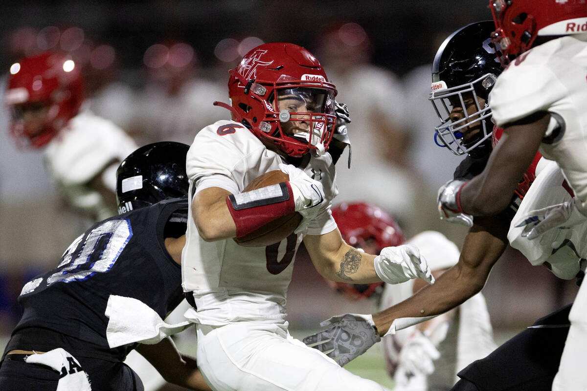 Arbor View wide receiver Jayden Williams (6) maneuvers through Desert Pines’ defense dur ...