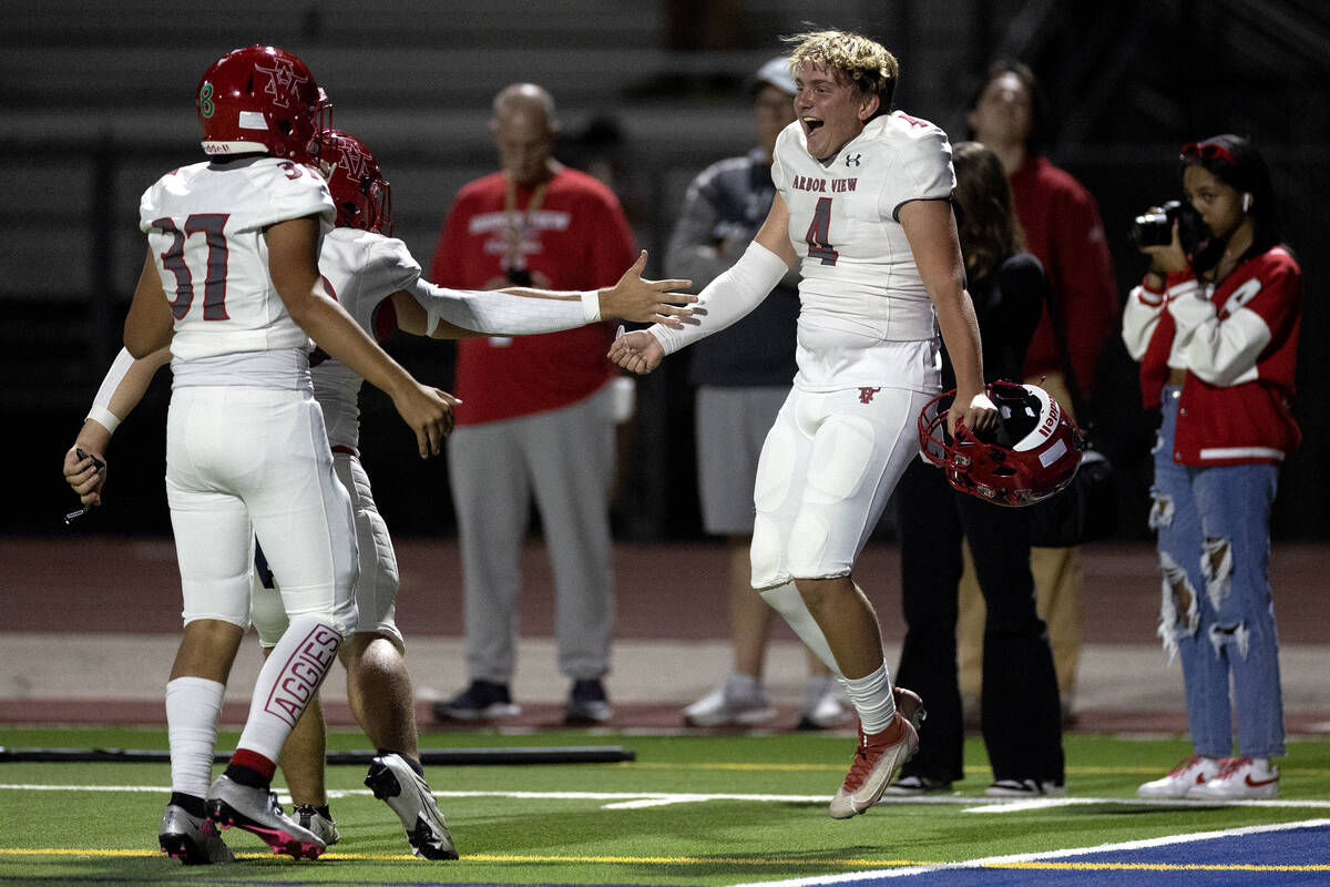 Arbor View kicker Jeau Vinatieri (4) celebrates after kicking the game-winning extra point duri ...