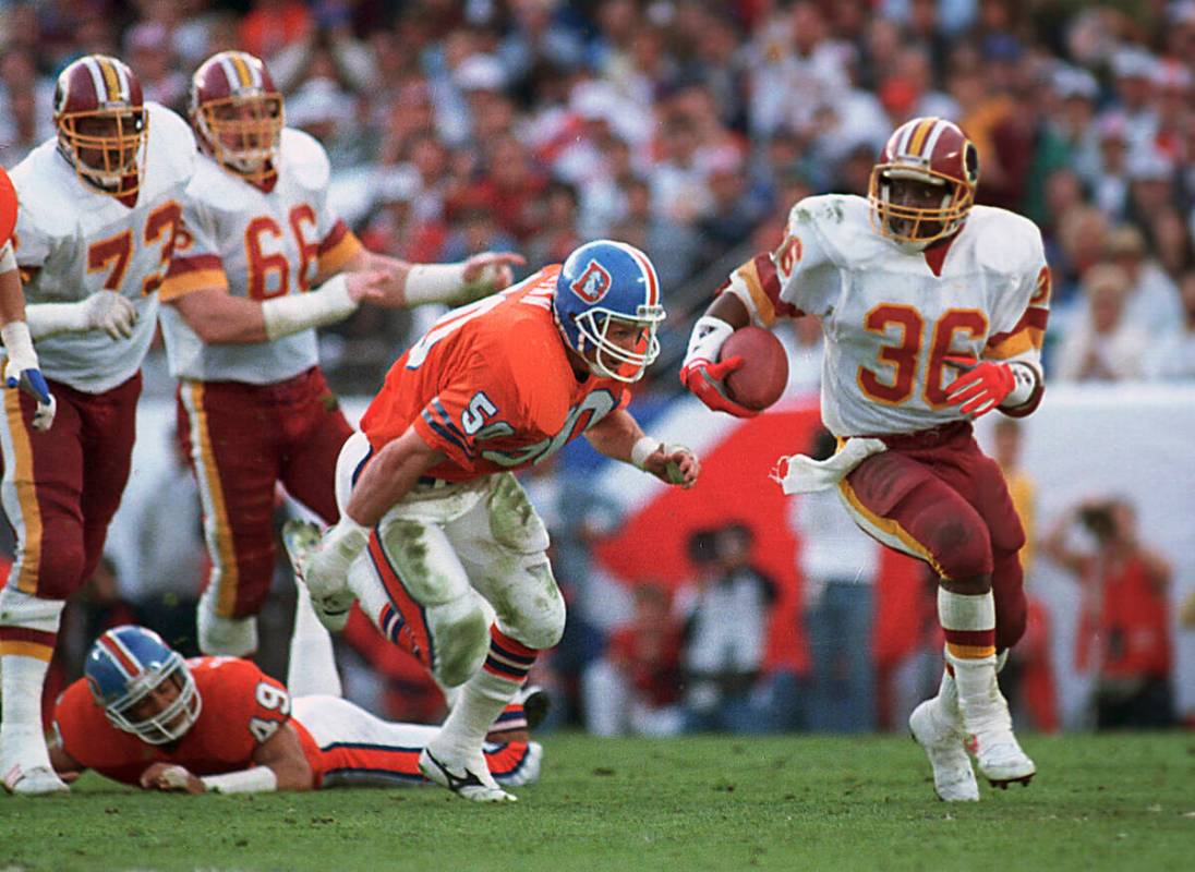 FILE - In this Jan. 31, 1988, file photo, Washington Redskins running back Timmy Smith (36) goe ...