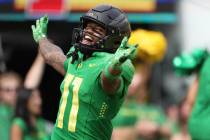 Oregon wide receiver Troy Franklin celebrates after scoring a touchdown against Colorado during ...