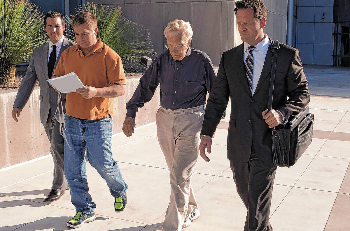 Eighty-seven-year-old physician Henri Wetselaar, second from right, leaves the Lloyd George Fed ...