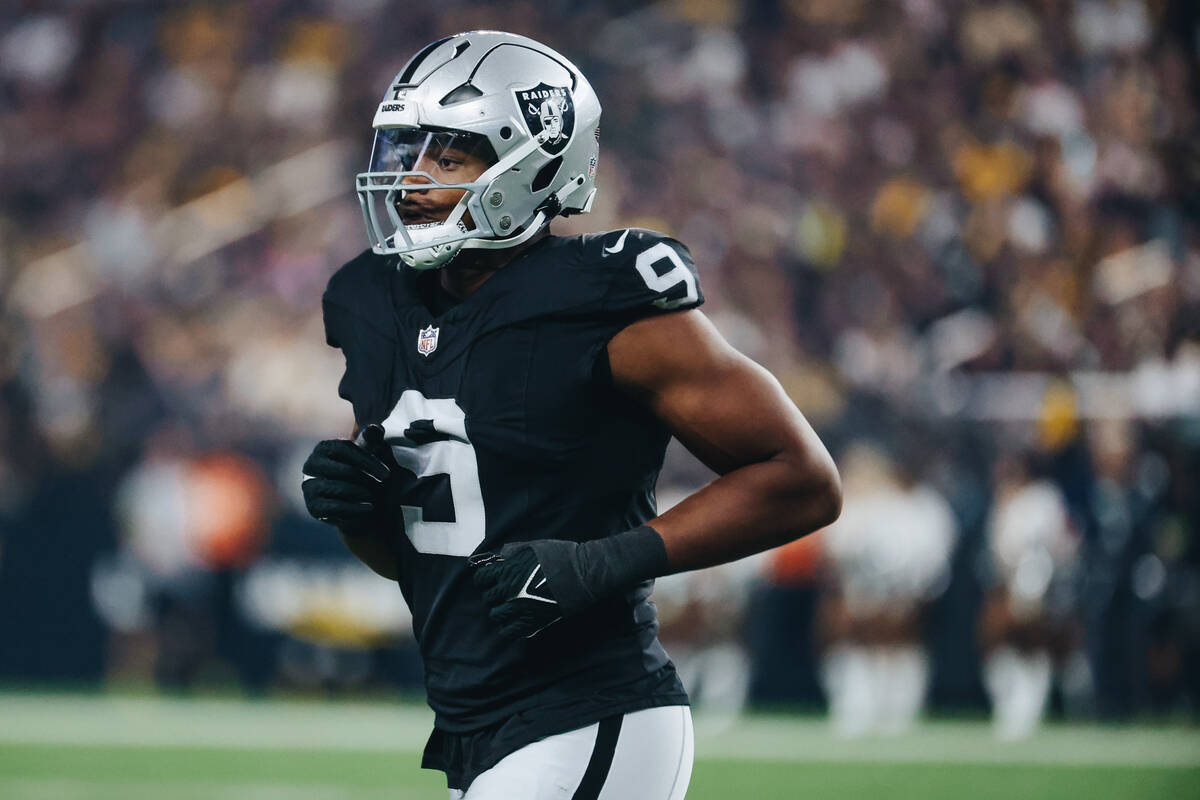 Raiders defensive end Tyree Wilson (9) runs off the field during the second half of a game agai ...