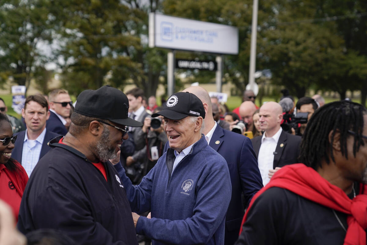 President Joe Biden joins striking United Auto Workers on the picket line, Tuesday, Sept. 26, 2 ...