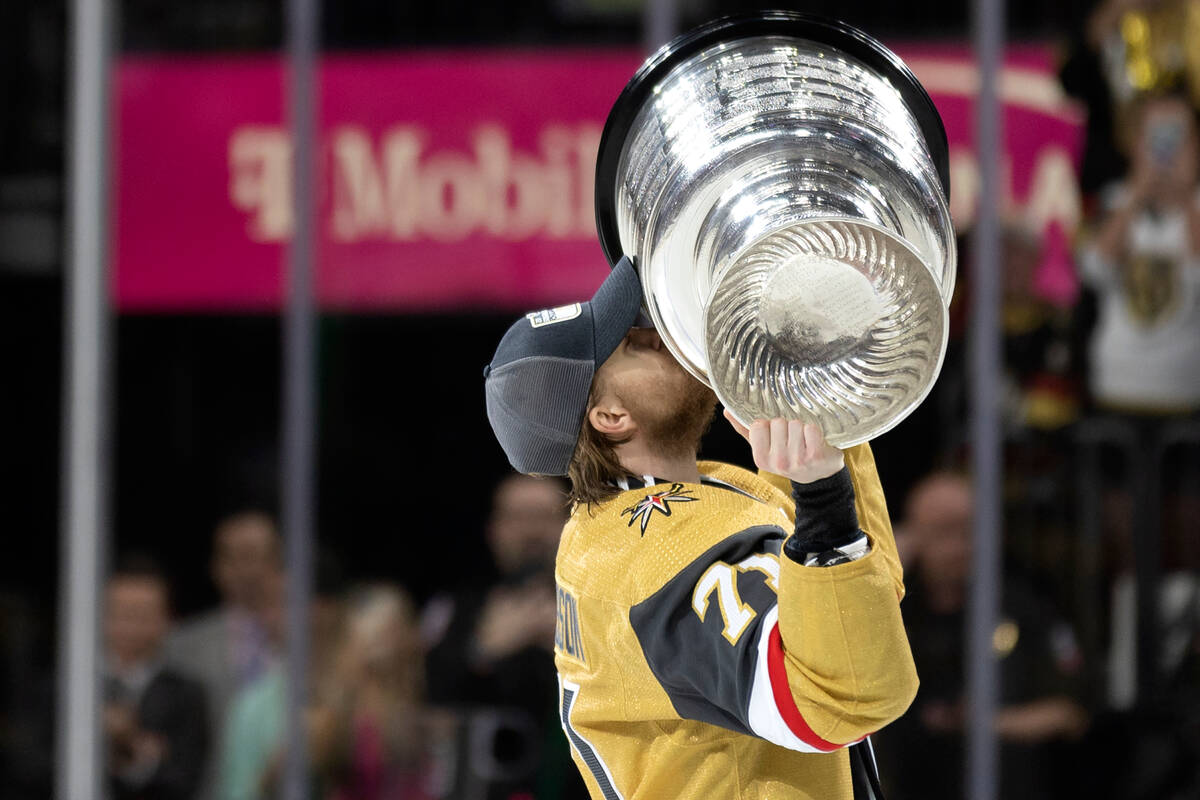 Golden Knights center William Karlsson (71) kisses the Stanley Cup after winning the NHL hockey ...