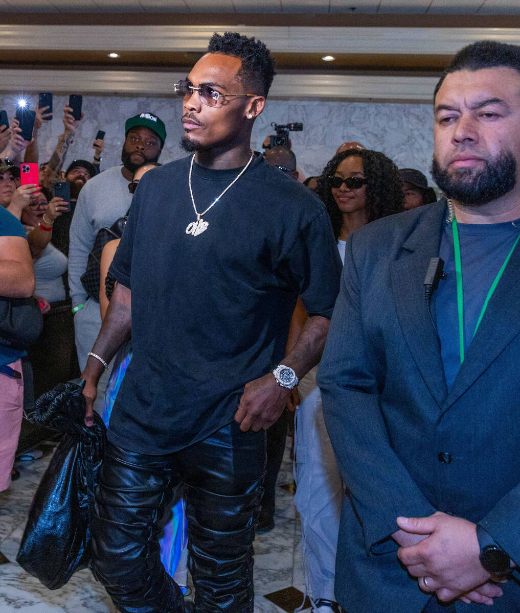 Boxer Jermell Charlo makes his way to the stage during fighter grand arrivals at the MGM Grand ...