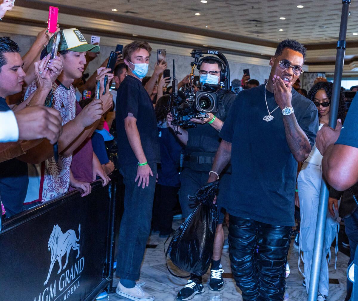 Boxer Jermell Charlo makes his way to the stage during fighter grand arrivals at the MGM Grand ...