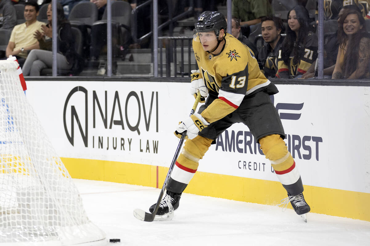 Golden Knights center Jakub Demek (13) brings the puck around the net during the first period o ...