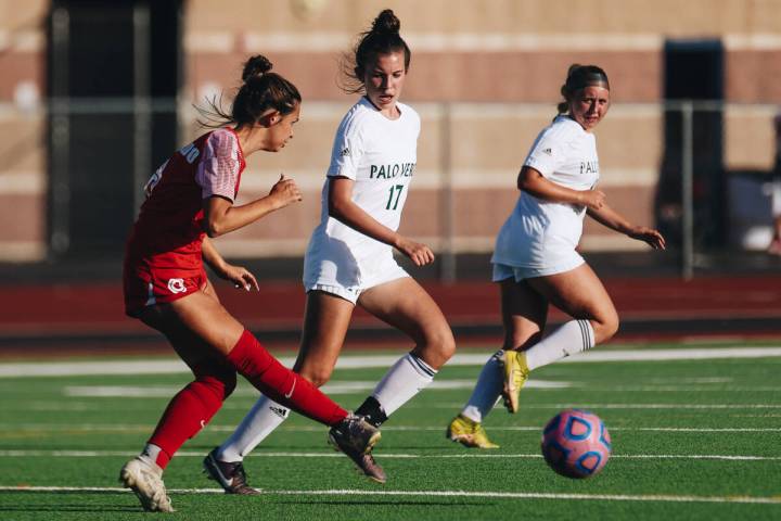 Palo Verde midfielder Isalia Minnalez (17) watches the ball as Coronado midfielder Tegan Smith ...