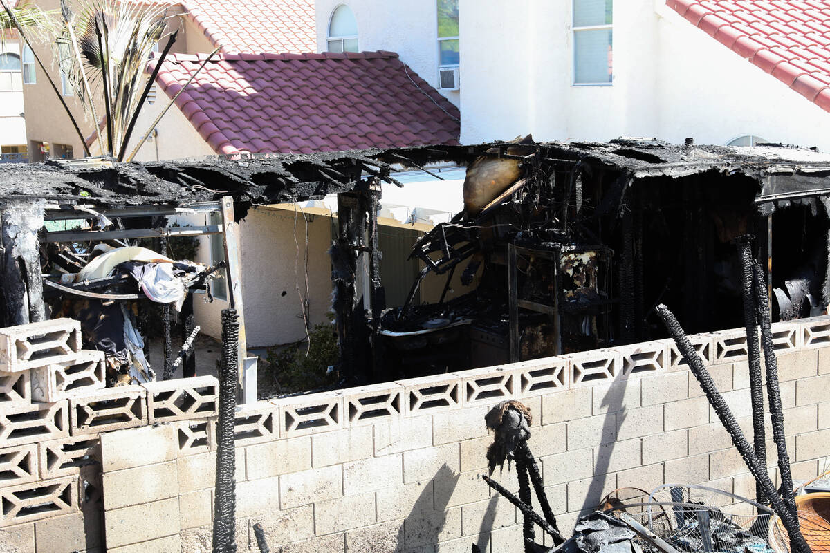 A neighbor’s trailer was demolished from a fire which spread from the house next door on ...