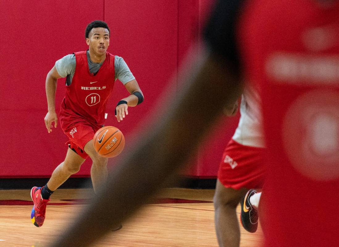 UNLV Rebels point guard Dedan Thomas Jr., (11) runs up court during team practice, on Wednesda ...