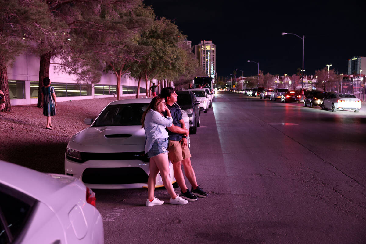 The Sphere lights up people on Manhattan Street near the Strip in Las Vegas Tuesday, Aug. 15, 2 ...