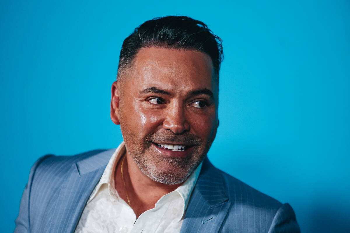 Boxer Oscar De La Hoya poses for photographs outside of the Sphere during its opening night on ...