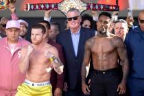 Canelo Alvarez, left, poses with Jermell Charlo after their weigh in at Toshiba Plaza on Friday ...