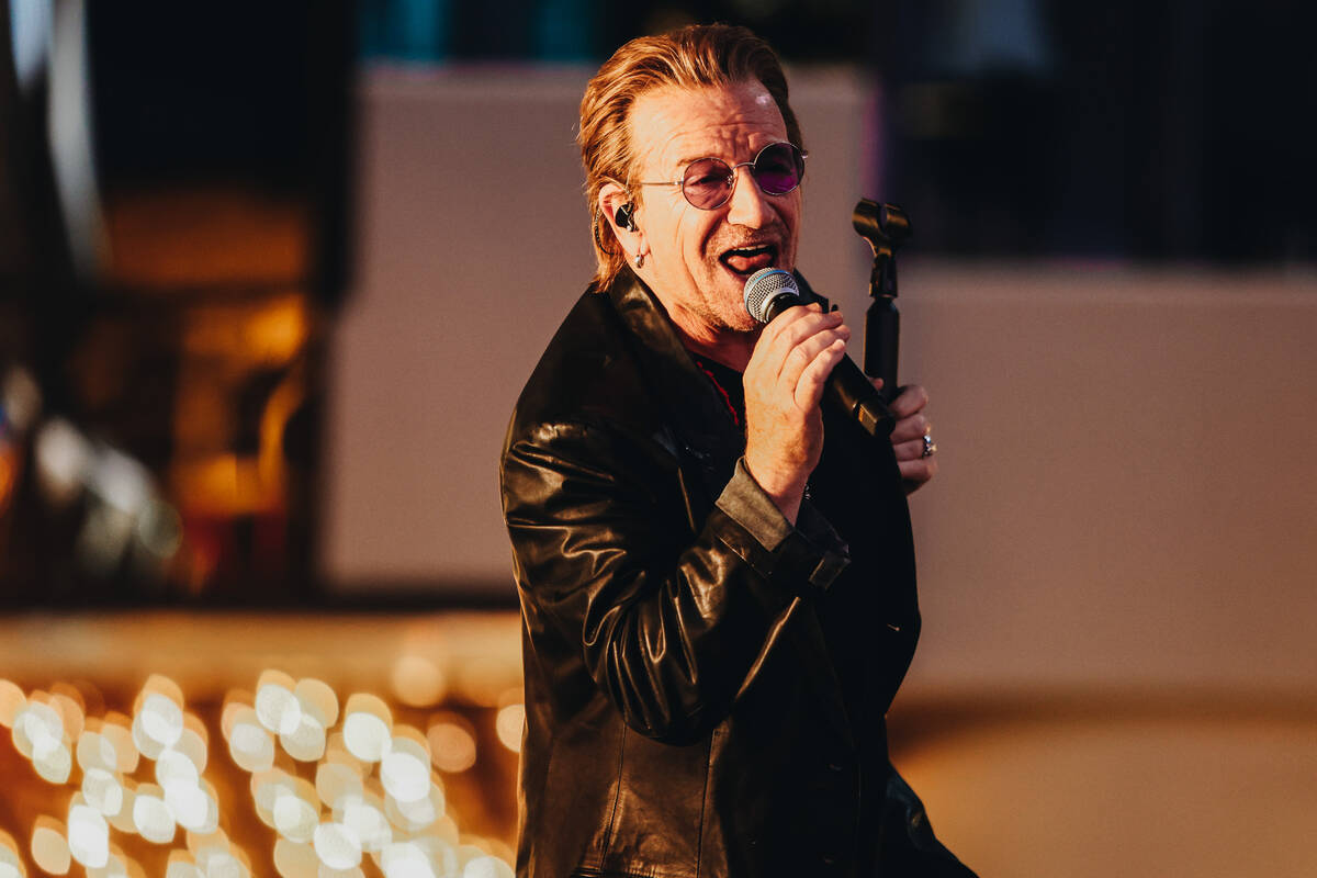 U2 performs while filming a music video in front of the Plaza hotel and casino on Sunday, Sept. ...